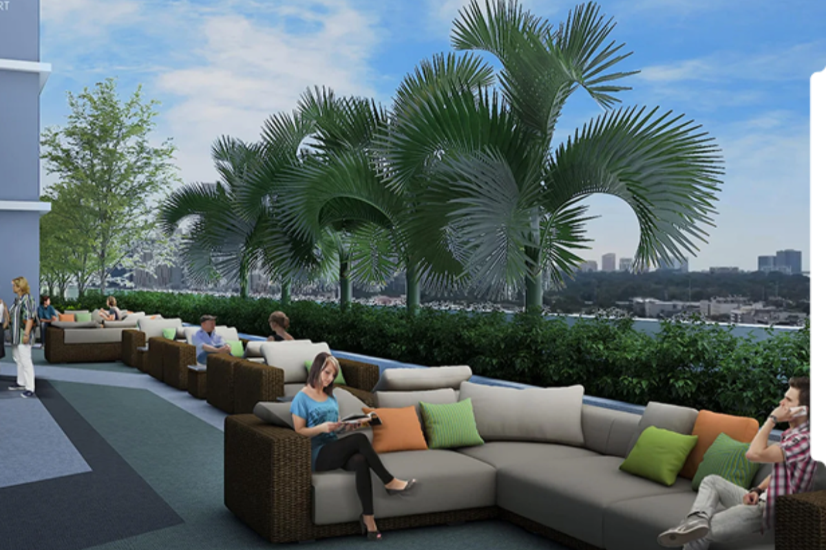 A render of the outdoor lounge of Uptown Arts Residence